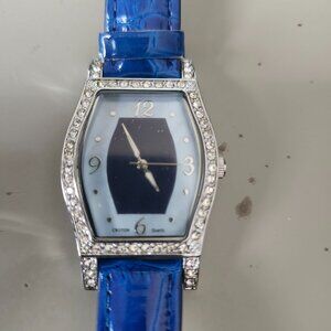 Croton diamond bezel Blue genuine leather bracelet.